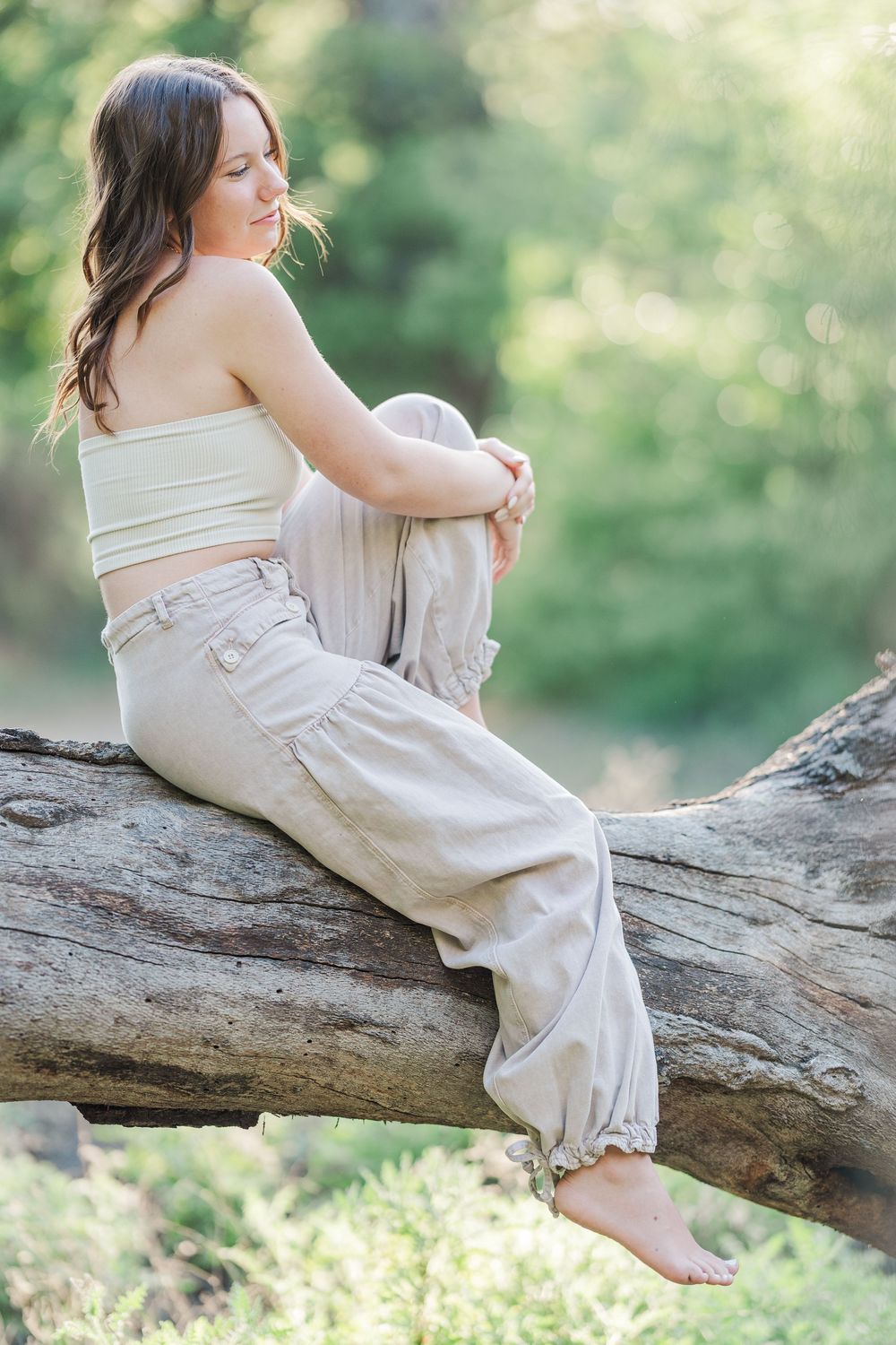 Simi Valley senior at Corriganville Park captured at sunset with yoga poses for unique, personalized senior photos.
