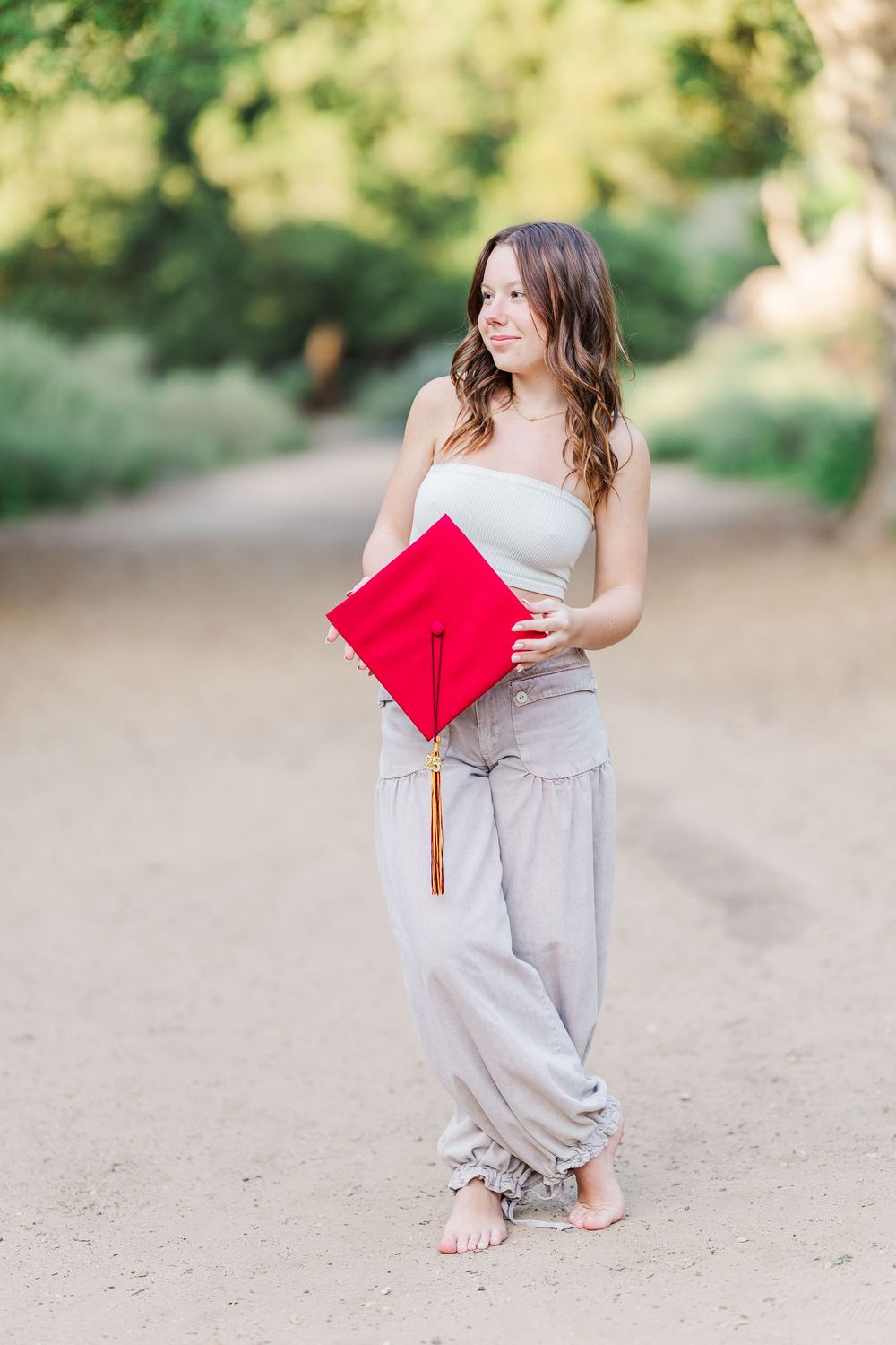Simi Valley senior at Corriganville Park captured at sunset with yoga poses for unique, personalized senior photos.