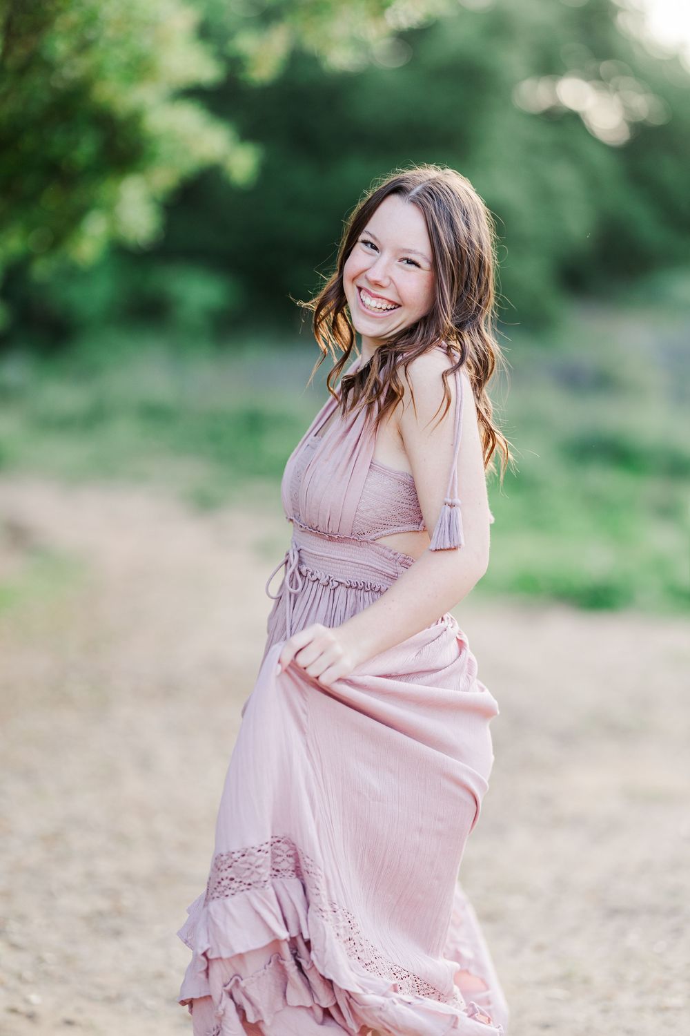 Simi Valley senior at Corriganville Park captured at sunset with yoga poses for unique, personalized senior photos.