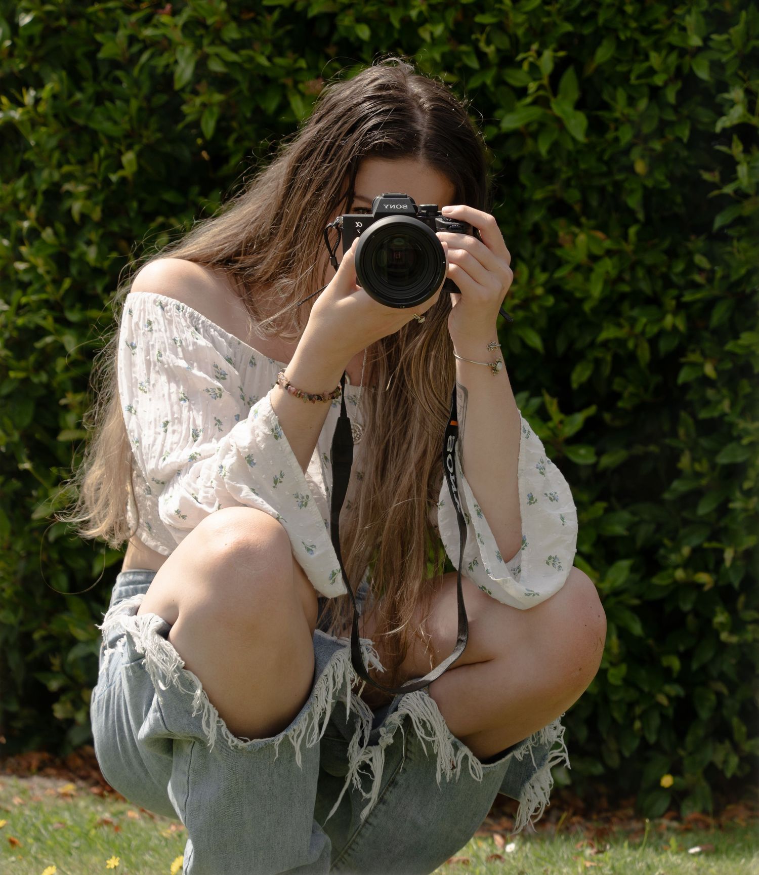 Faith Templer taking a self portrait outdoors