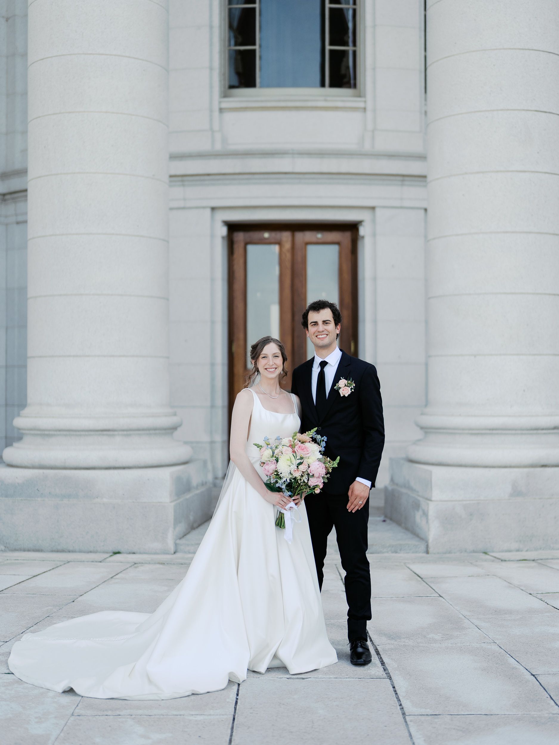 A series of wedding photos showing a bride and groom posing in front of the Wisconsin State Capitol building in Madison.