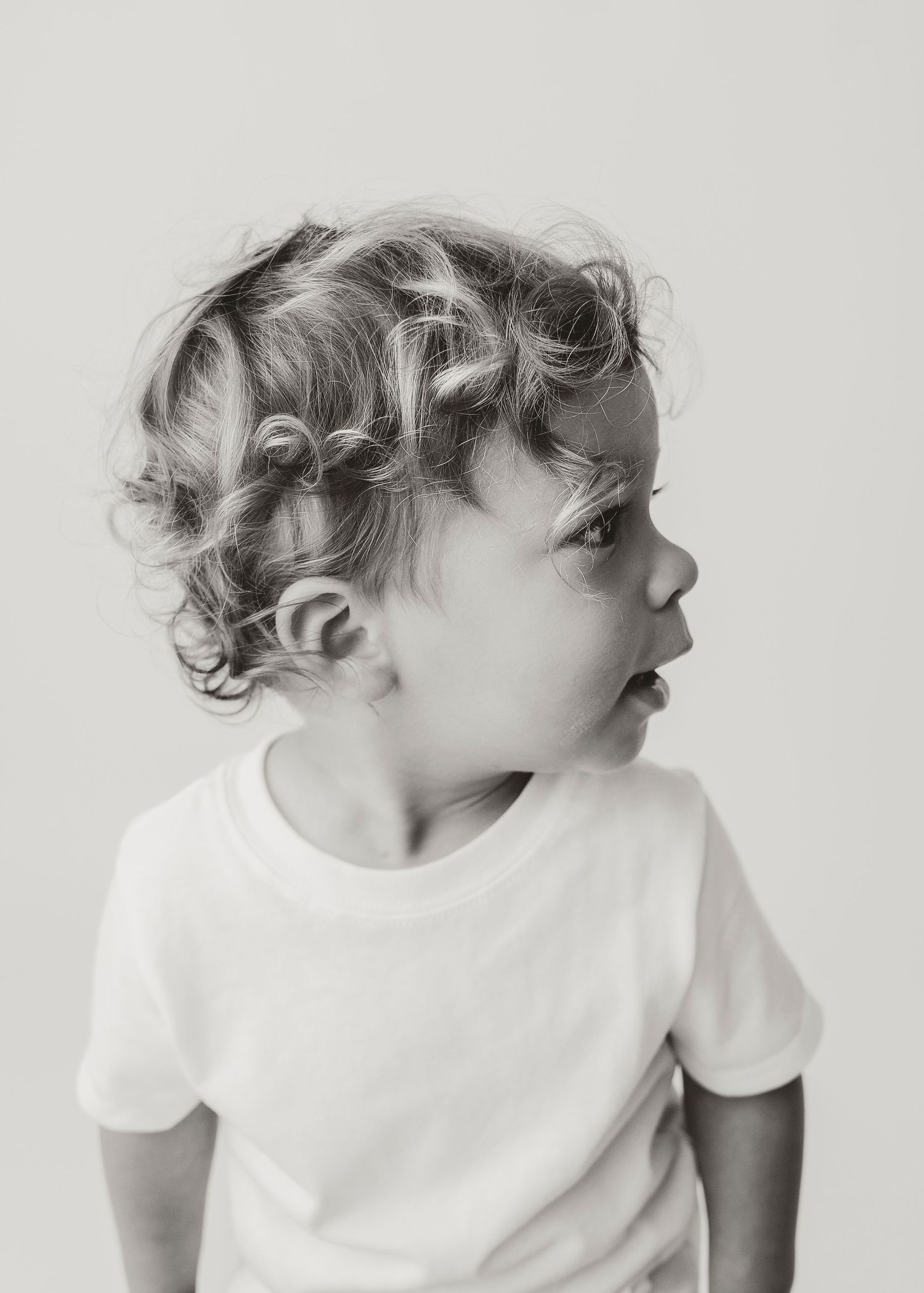 Child personality portrait session in Houston, TX capturing playful expressions, natural light, and authentic childhood moments.