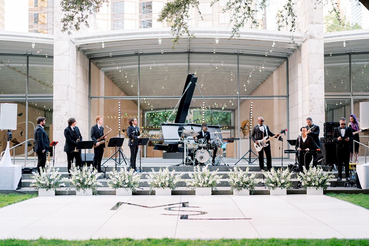 Wedding band plays during a reception at the Nasher Sculpture Center, a Dallas wedding venue