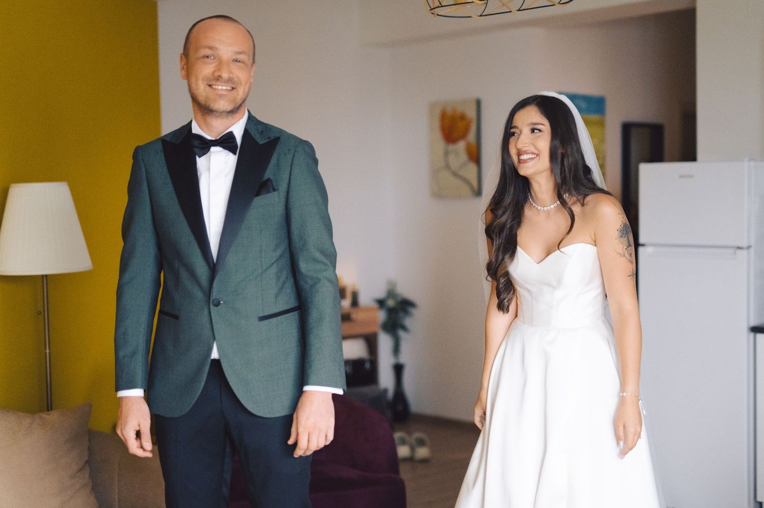 A series of formal wedding photos displayed together showing posed moments in a white and green color scheme.