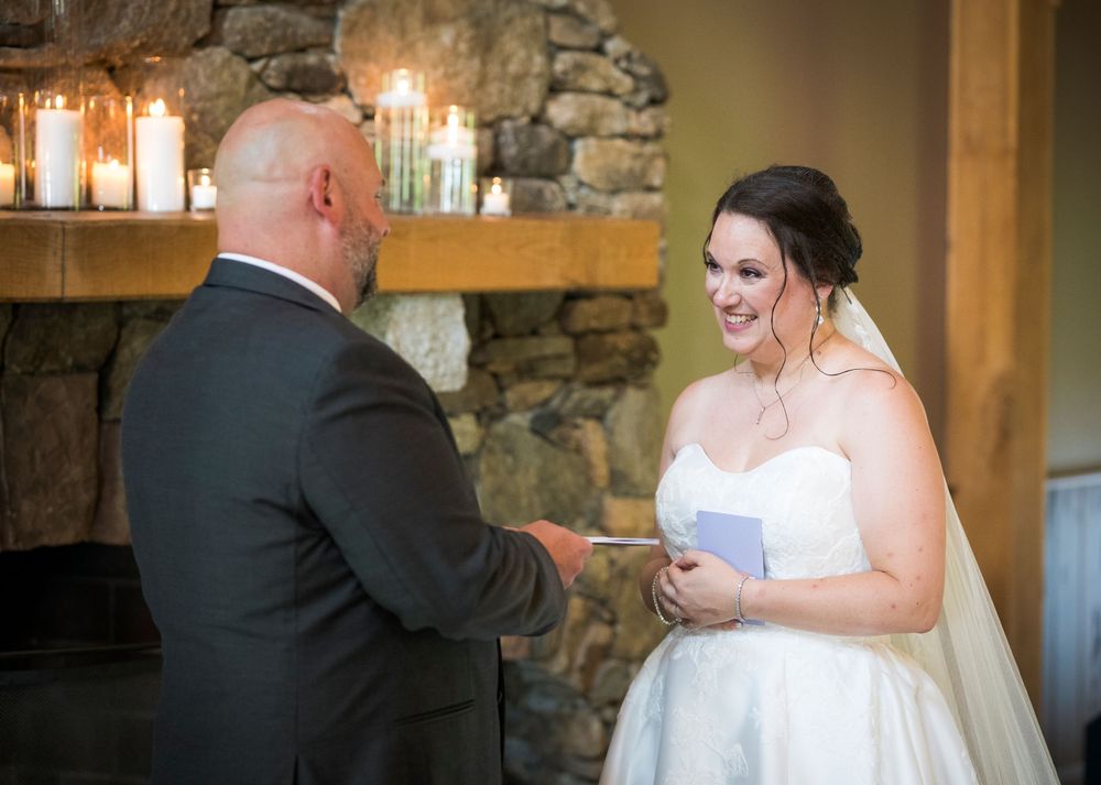 Collage of wedding photos showing intimate moments at a rustic stone venue with warm lighting.