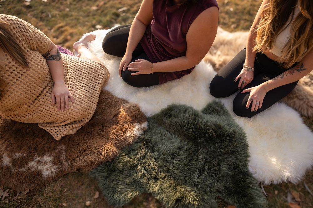 Three women gather for a ceremony portrait for a small business branding photography session.