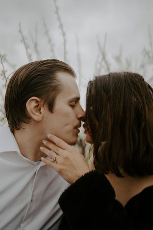 Intimate black and white portrait showing tender affection.