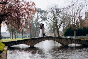 Cotswolds wedding photographer capturing a proposal at Bourton on the water.