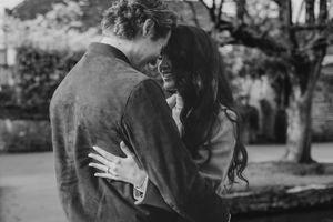 Cotswolds wedding photographer capturing a proposal at Bourton on the water.