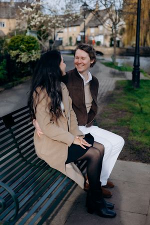 Cotswolds wedding photographer capturing a proposal at Bourton on the water.