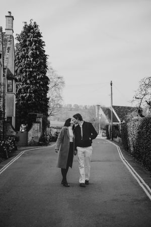 Cotswolds wedding photographer capturing a proposal at Bourton on the water.