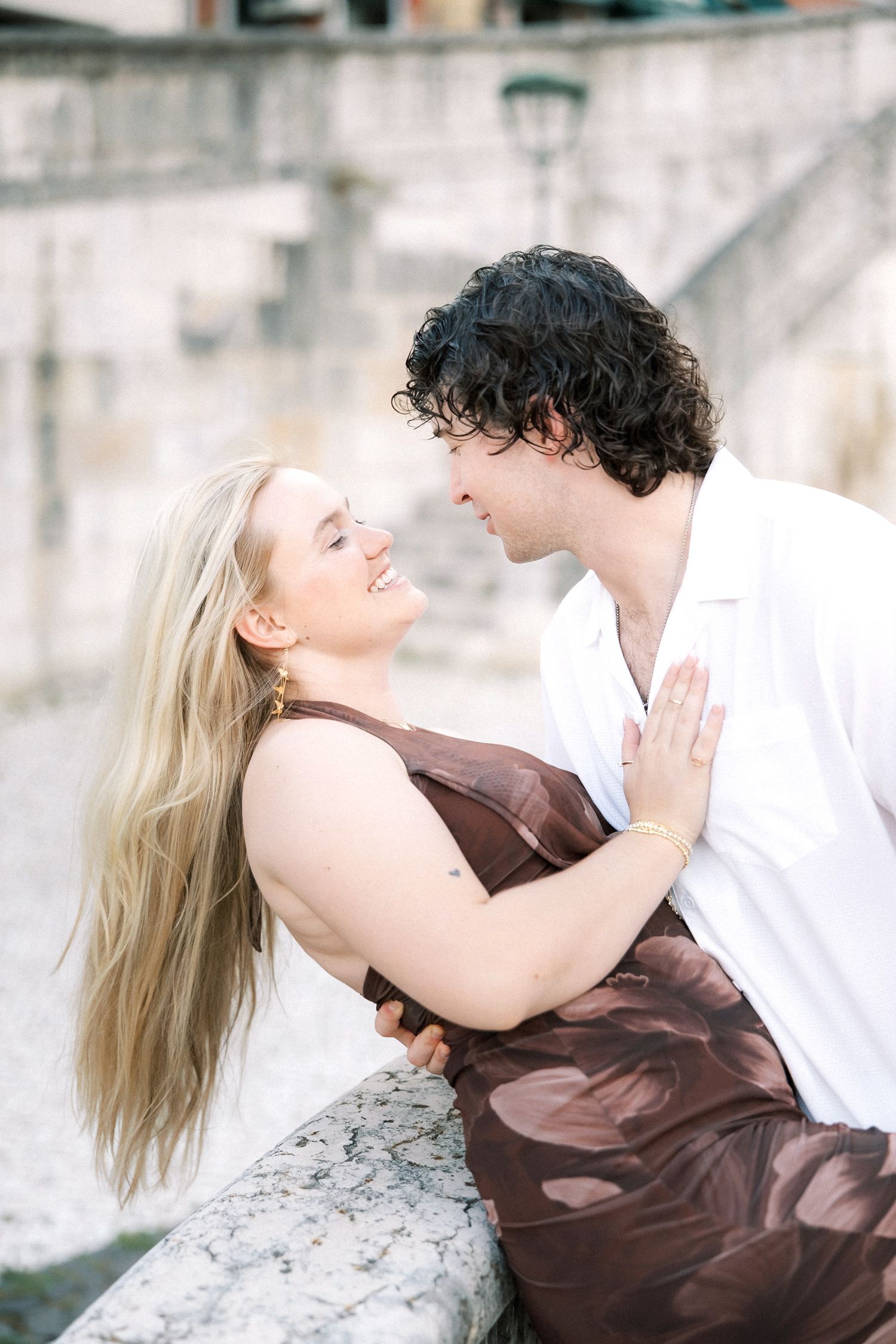 Destination wedding couple embracing during an intimate Lisbon couple session