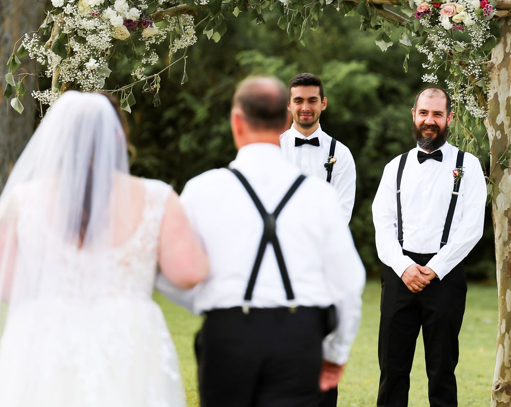 Father of bride walking her down the aisle