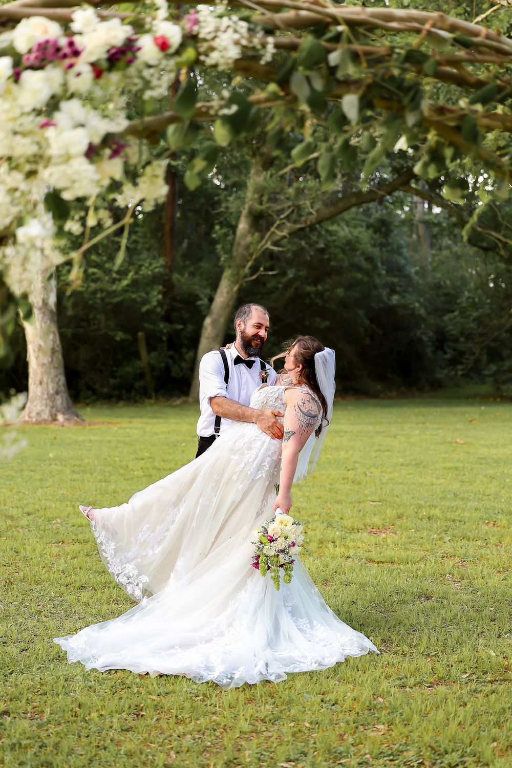 Husband and wife look at each other after saying I do