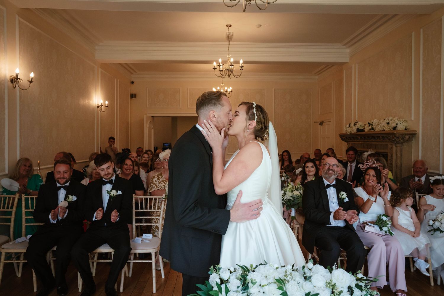 Eastington Park Wedding Photographer near Stroud in Gloucestershire First kiss for couple