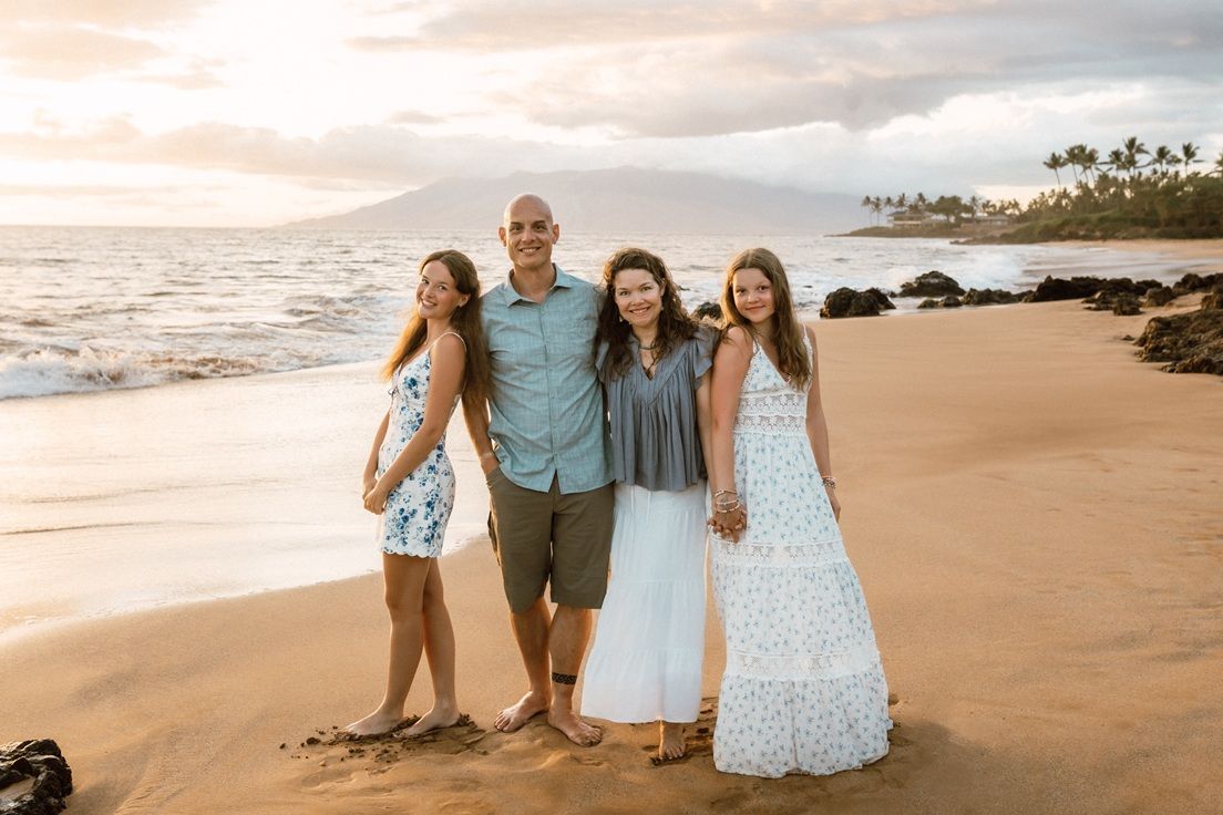 Maui family photographer photo against beautiful Maui sunset beach by ohwowfotos.
