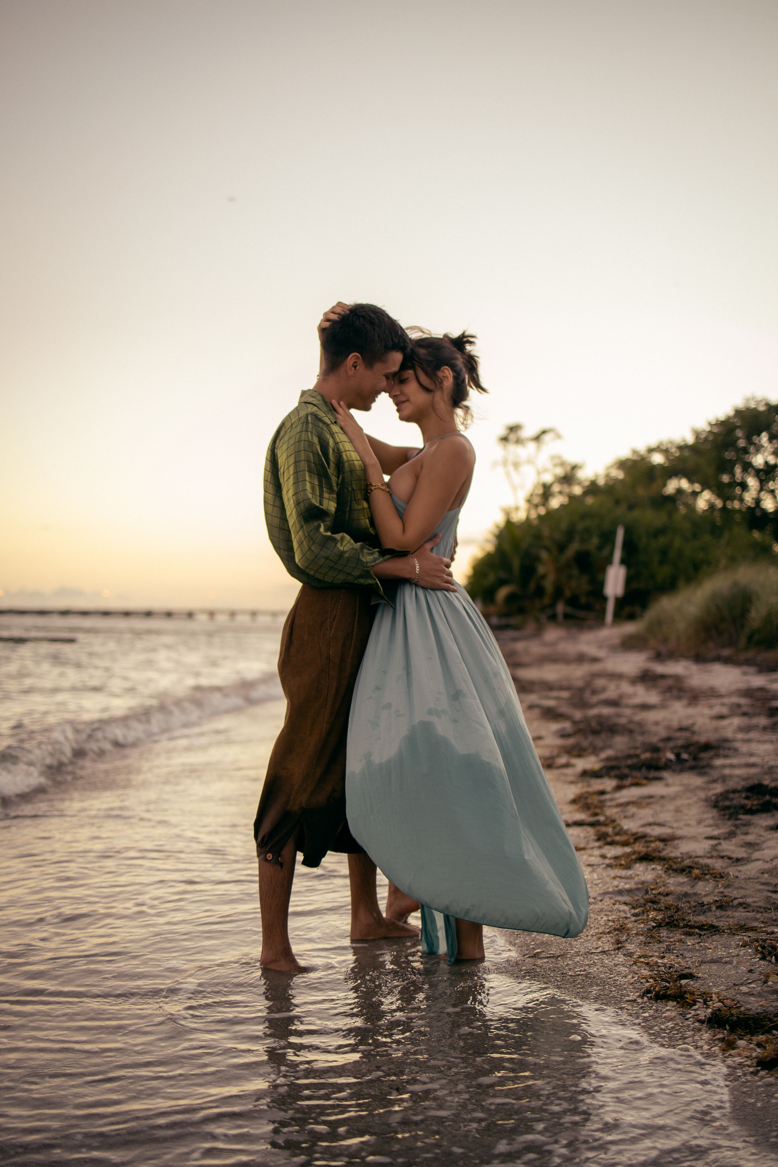 Romantic South Florida beach portrait, engagement and wedding-inspired couples photography by MannyPortraits.
