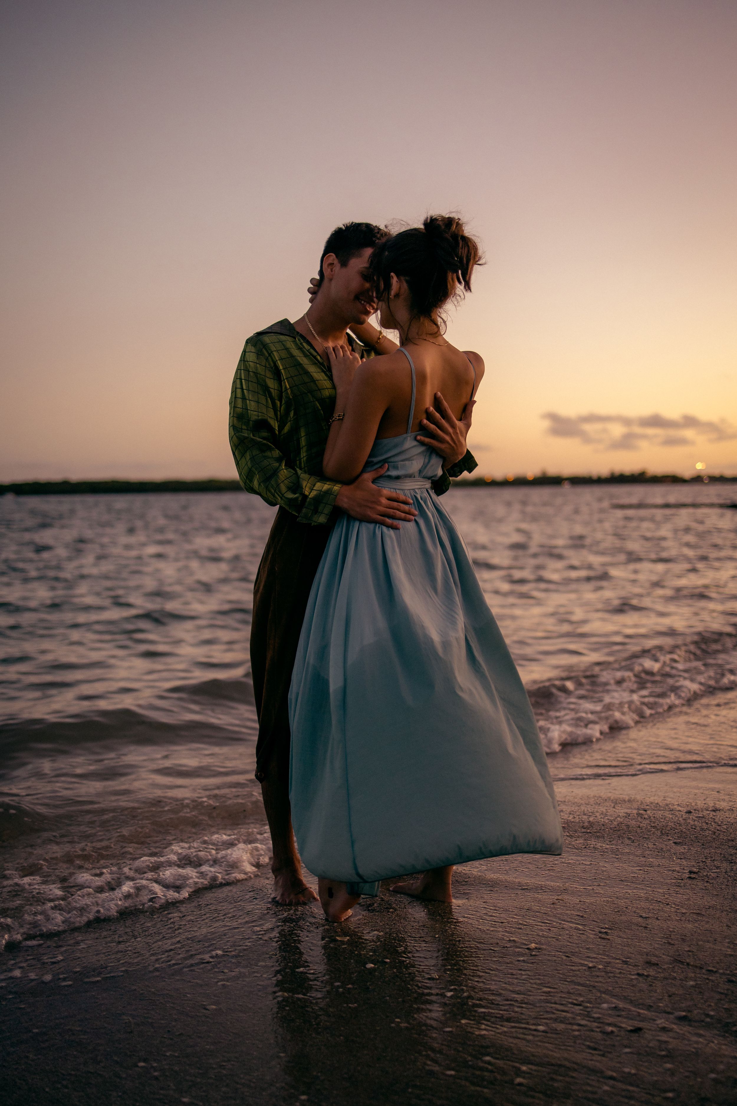 Romantic Miami beach sunset portrait, perfect for engagements, anniversaries, and weddings captured by MannyPortraits.