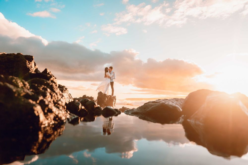 Maui couple engagement photographer photo against beautiful Maui sunset beach by ohwowfotos.