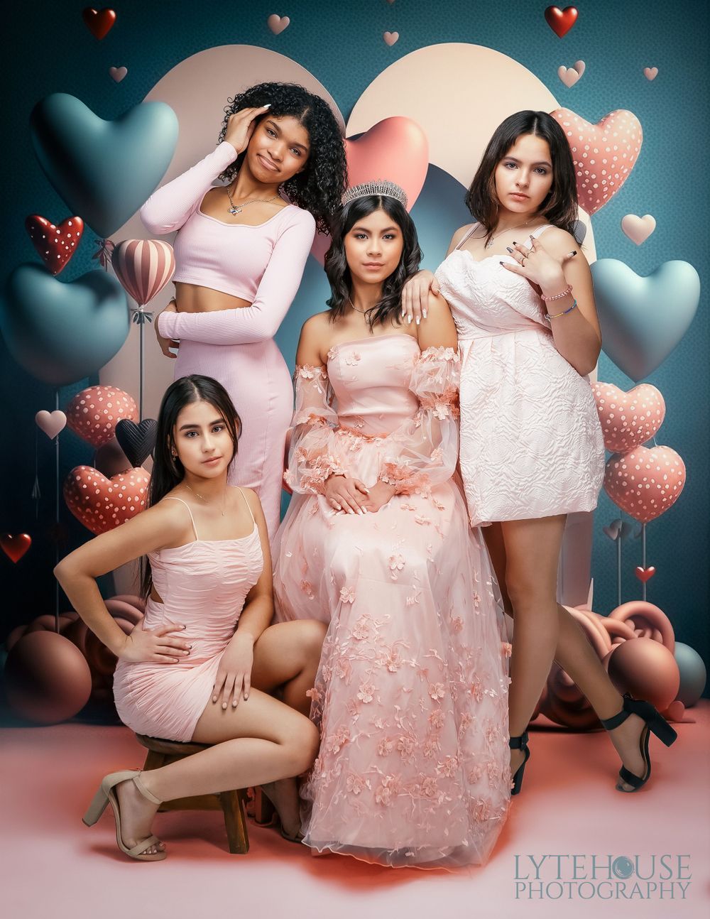 the four girls, all in pink dresses, are posing in front of hearts, in the style of tabletop photography, contemporary