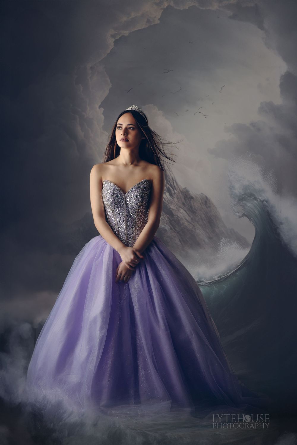 a beautiful girl in a purple gown in the ocean on her birthday, in the style of stormy seascapes, detailed fantasy,