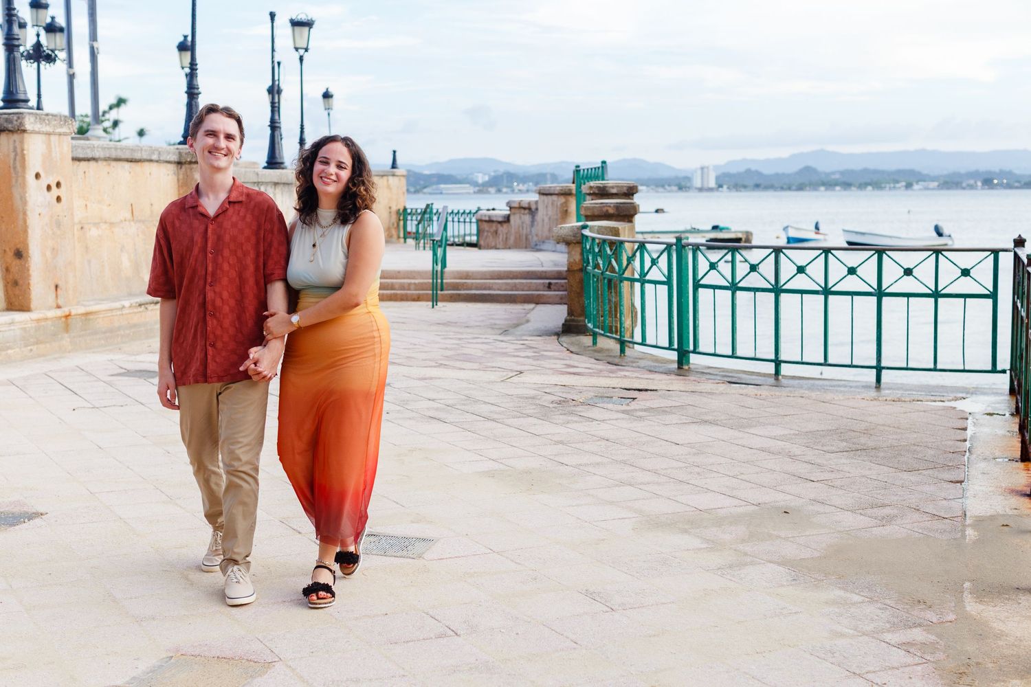 Surprise marriage proposal in Old San Juan, Puerto Rico. Paseo de la Princesa. Man and woman.