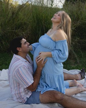 Intimate sequence of romantic couple laying in grass during golden hour outdoor photoshoot.