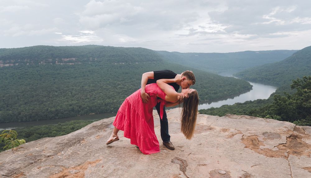 A series of photos showing someone in pink dress posing dramatically on a cliff edge overlooking mountain landscapes.