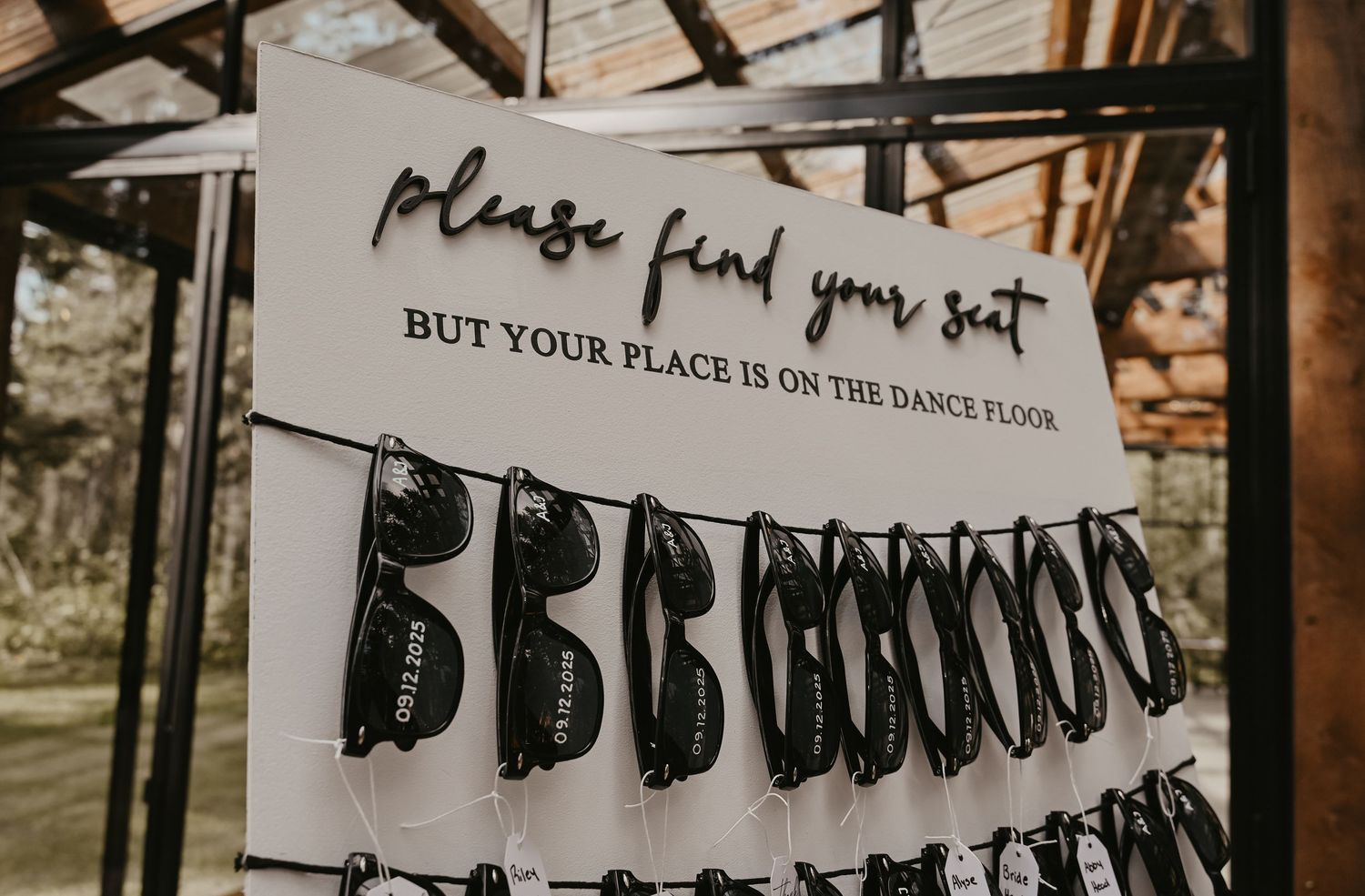 Decorative banner with text hanging at wedding reception.