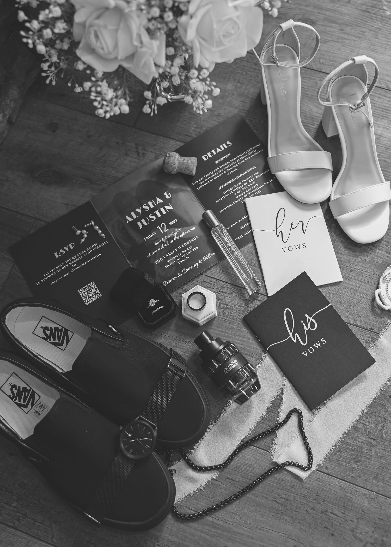 Wedding details including rings, invitations, and floral arrangements in black and white.
