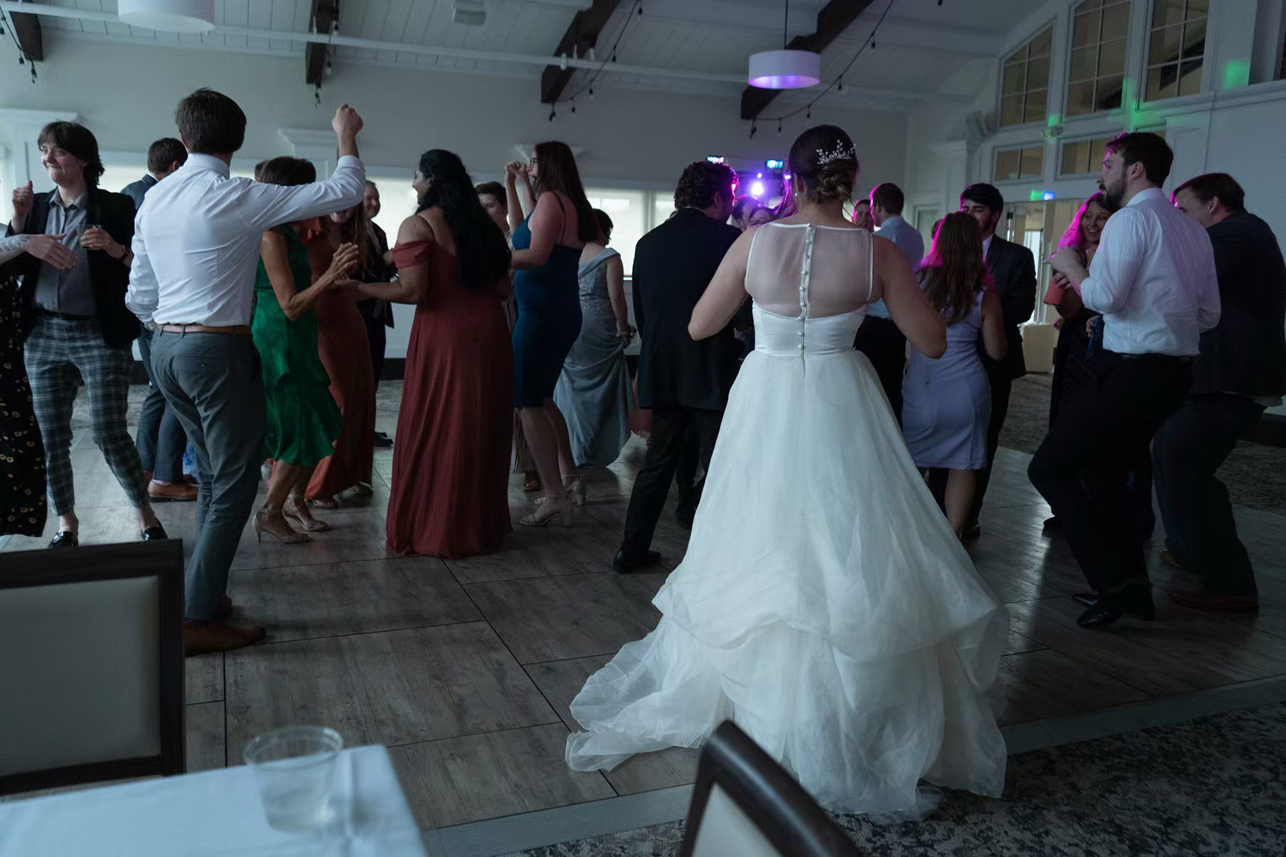Wedding reception dance floor with guests dancing in Nationwide Conference Center