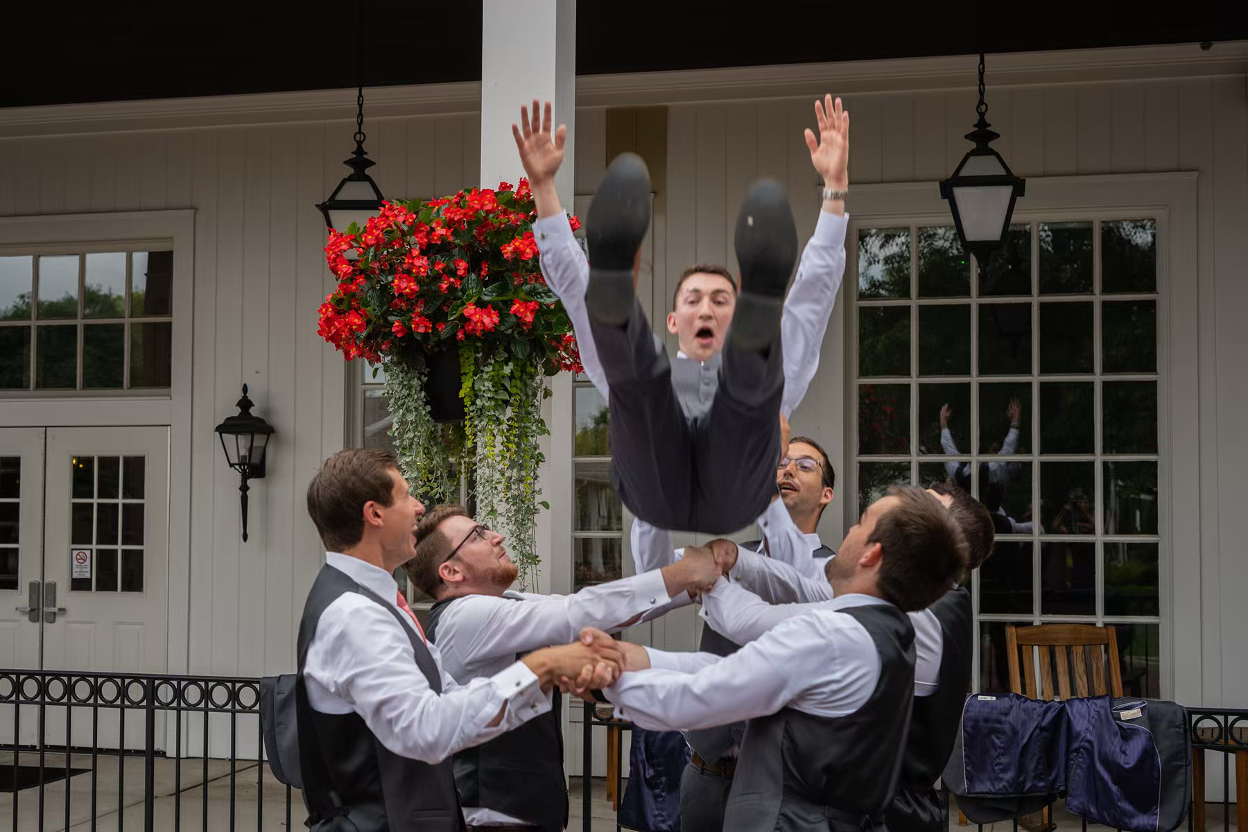 Groomsmen in funny photo with the groom in Nationwide Conference Center
