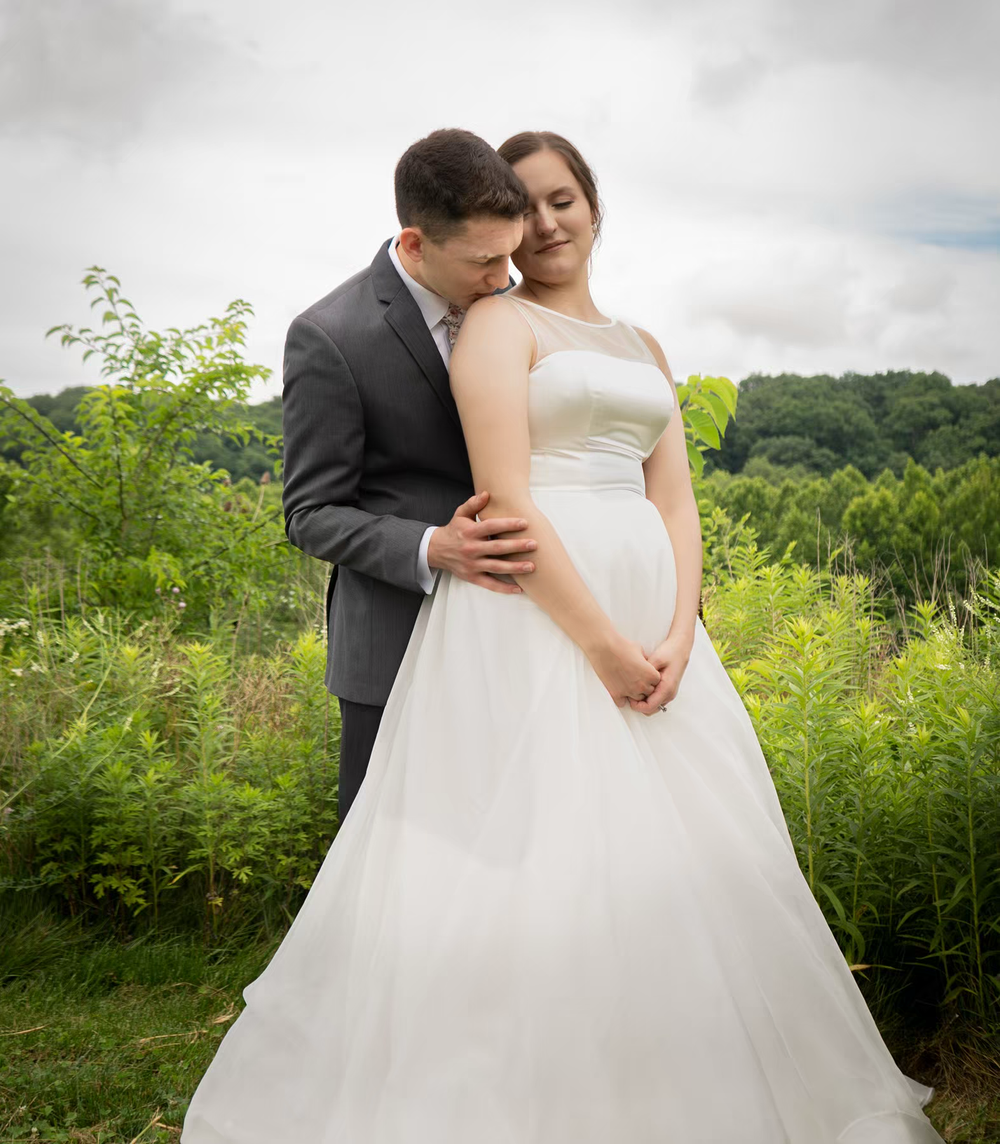Romantic wedding couple embraces inNationwide Conference Center