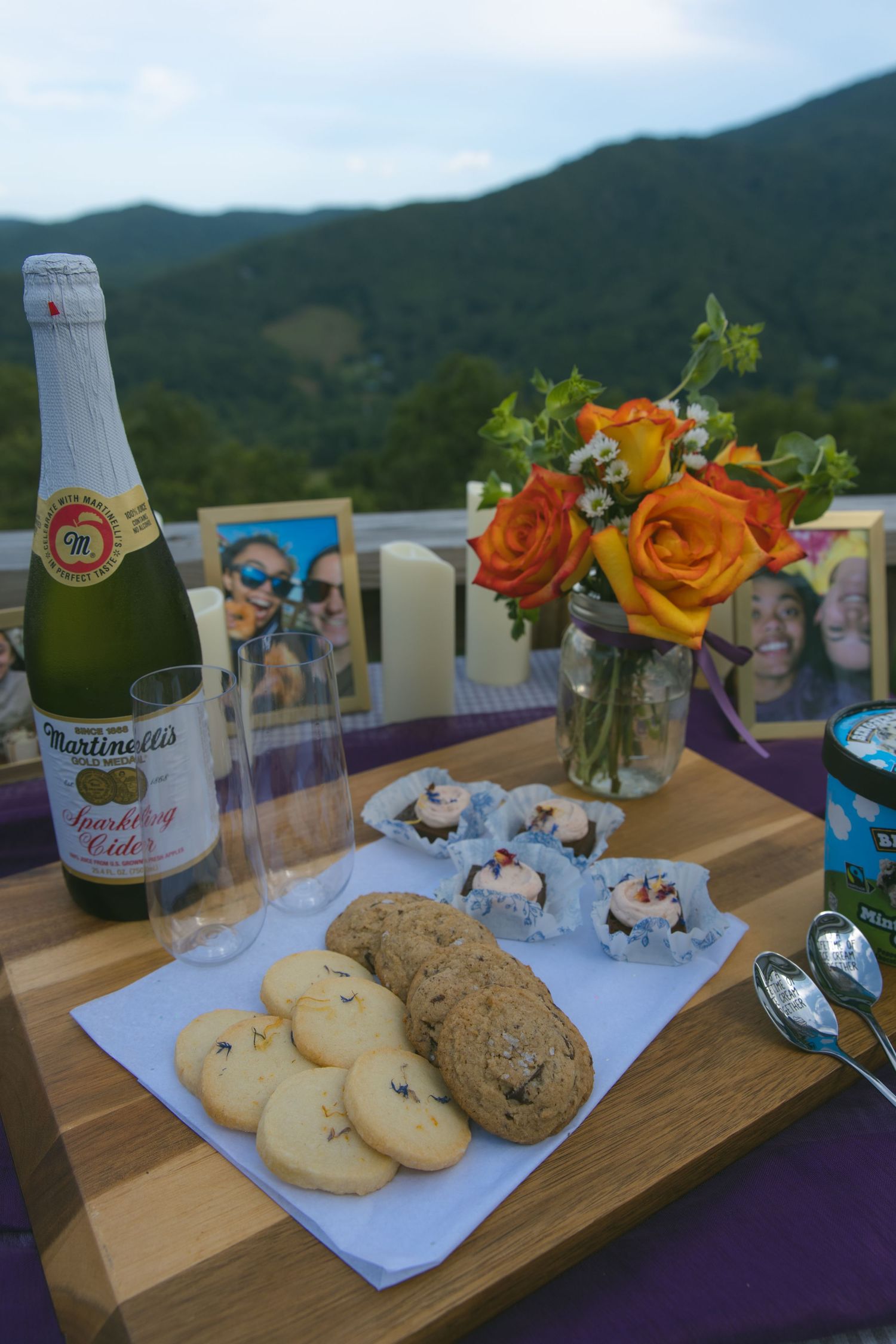 lgbtq wlw lesbian couple proposal engagement mountain view luxury picnic flowers candles dessert ring NC asheville treats cookies cider