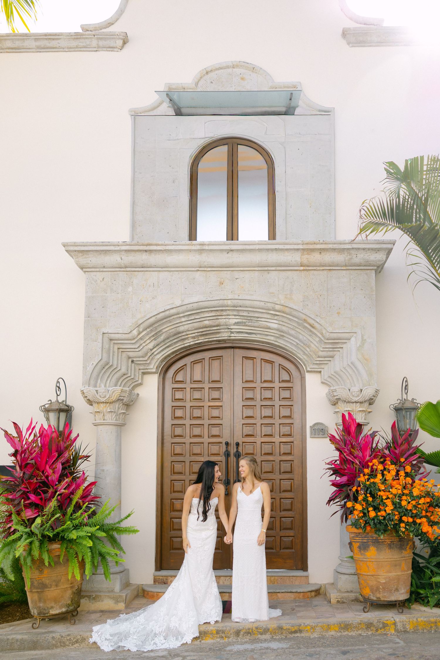 lesbian wedding. vibrant tropical flowers. queer wedding. wedding dresses. destination wedding. Puerto Vallarta.