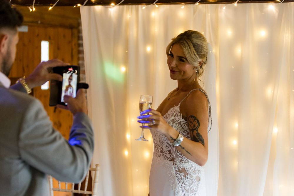 Wedding reception venue decorated with twinkling string lights creating a romantic ambiance.