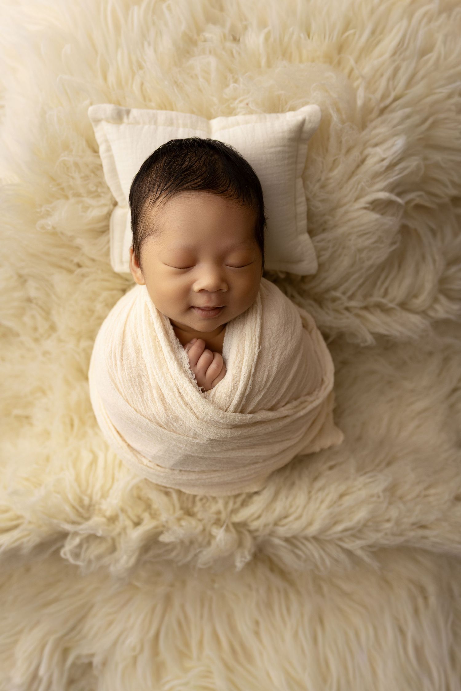 Backlit side profile of sleeping baby