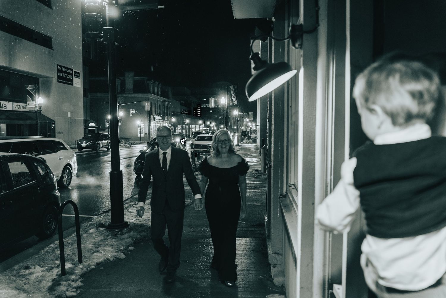 Elegant wedding photography of couple walking to the venue to celebrate with friends and family.