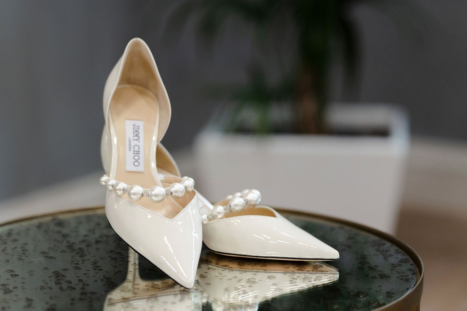 Brides shoes at BallenIsles Country Club in Palm Beach, Florida during a wedding photographed by Ohio photographer Tom Forrest.