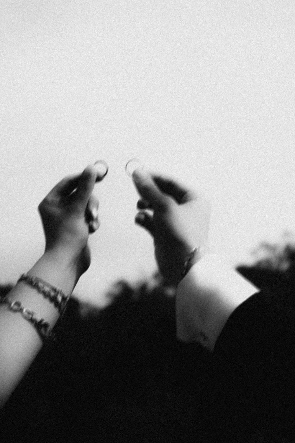 elopement in portugal wedding rings hands