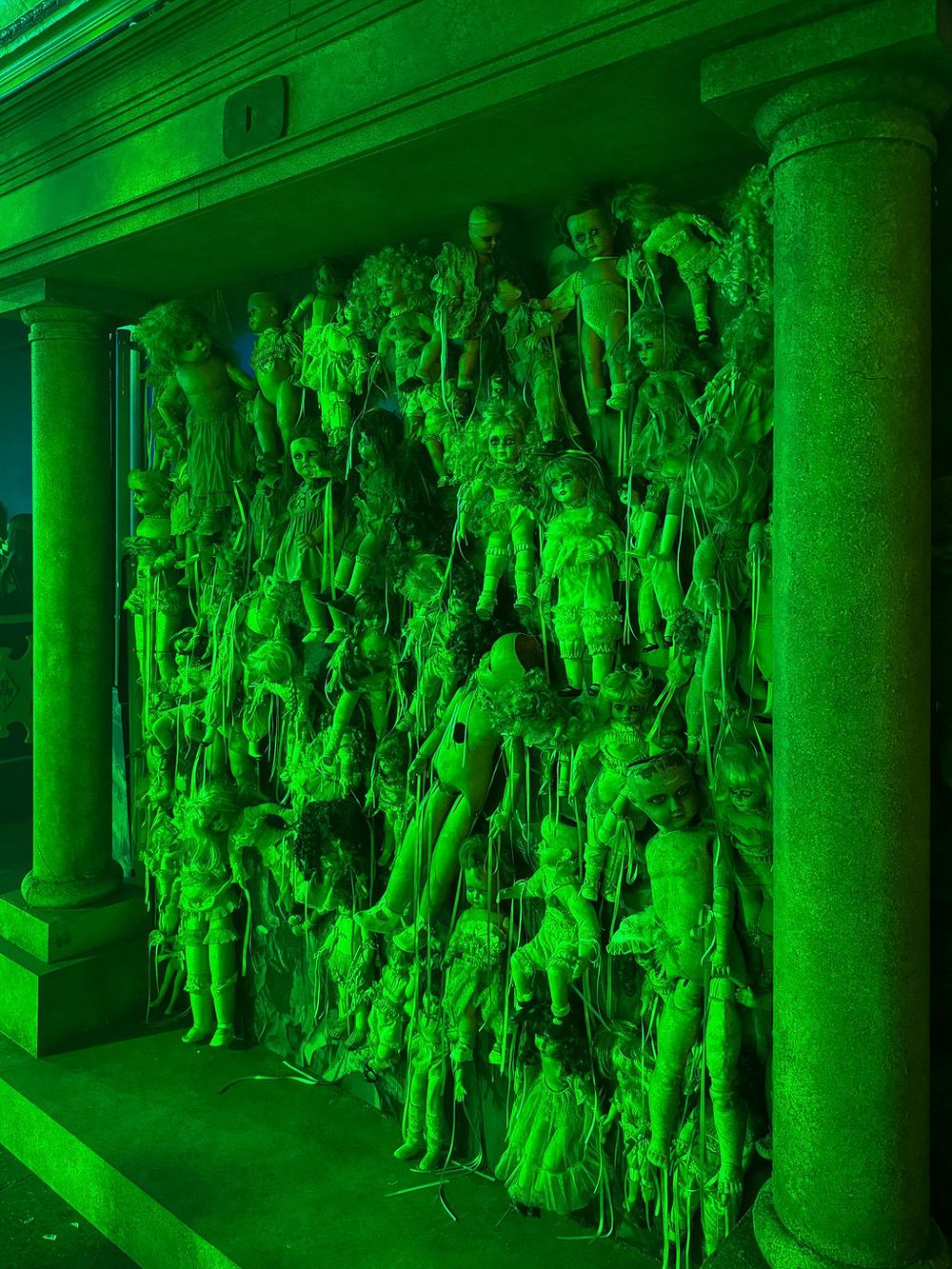 Halloween decor with dolls at the YouTube x Lady Gaga Mayhem Halloween Party – La Paloma Barcelona