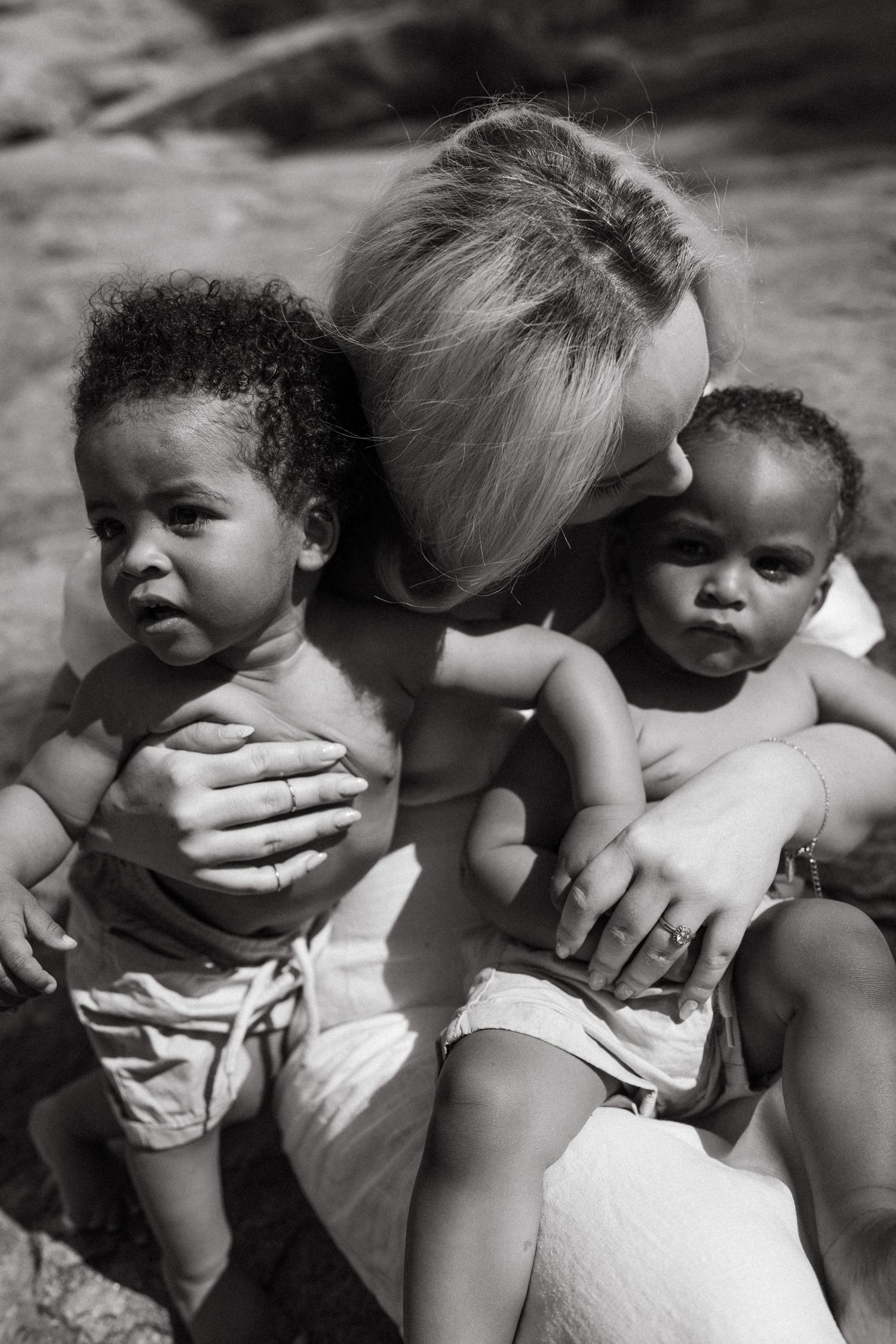 Black and white close-up series capturing emotional expressions and gentle touches.