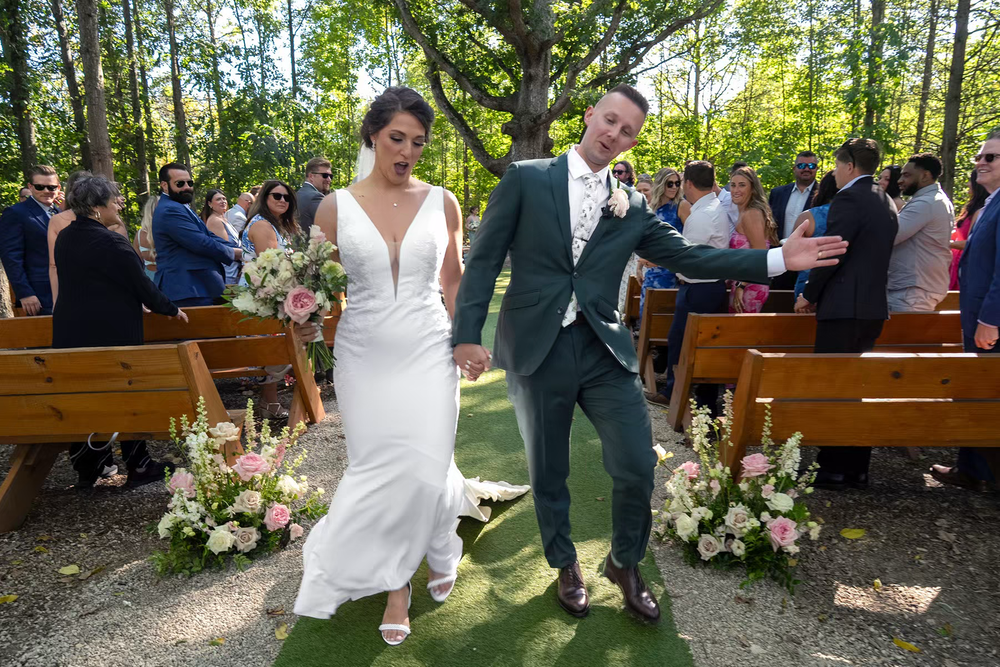 Outdoor wedding ceremony takes place in Columbus Ohio wooded venue