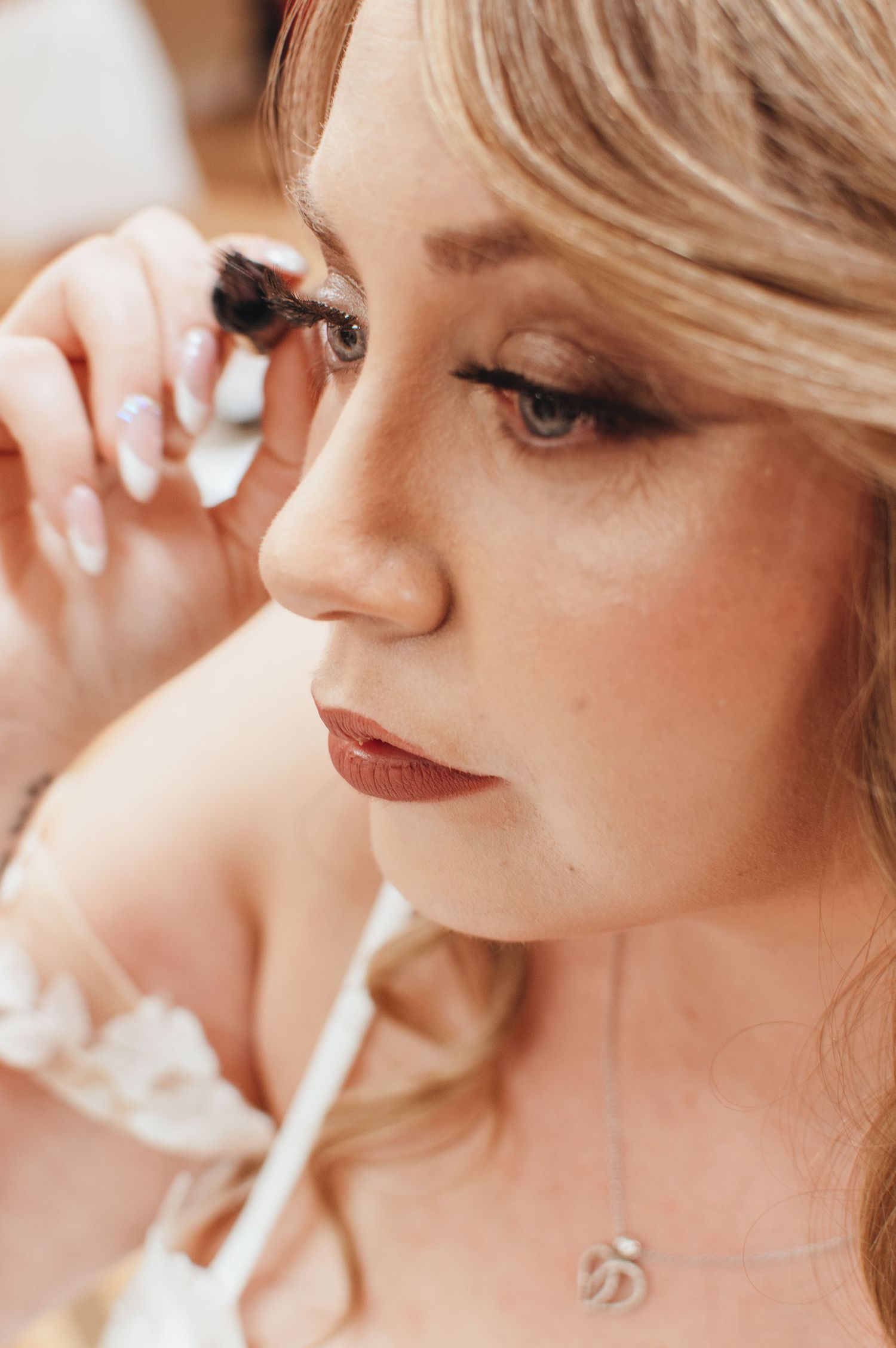 Close-up beauty shots showing elegant bridal makeup and jewelry details.