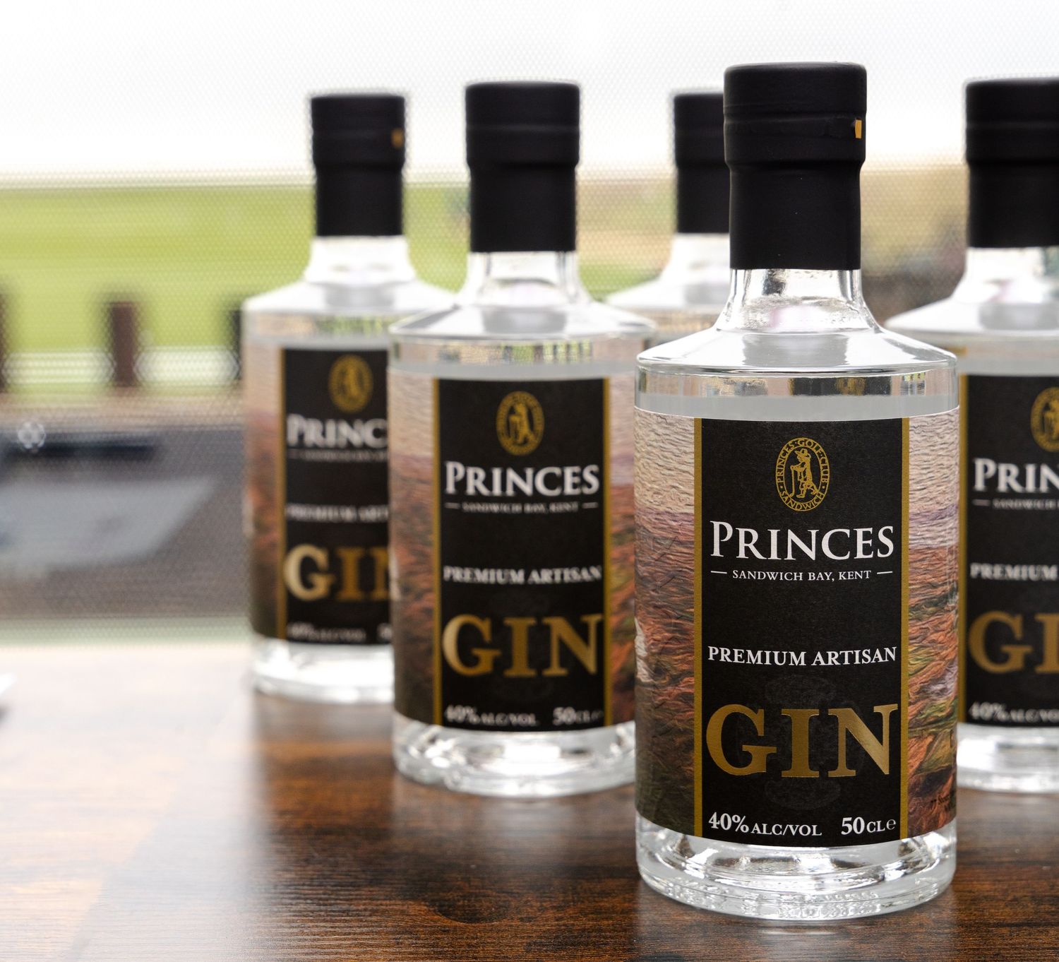 golf course on location product photography of bottle in gift shop