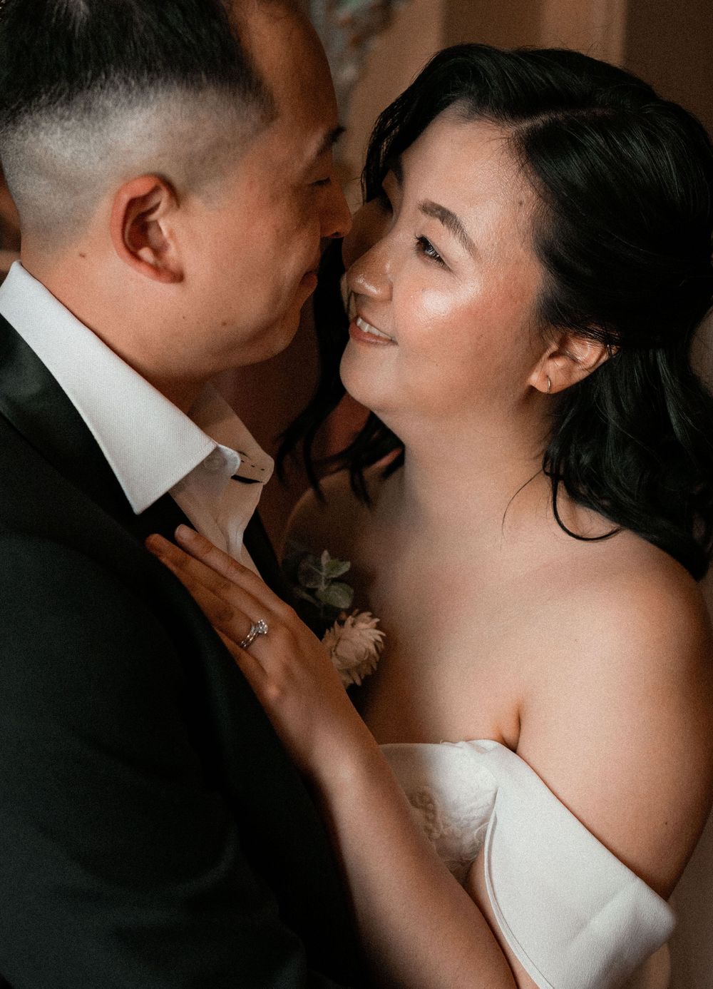 A romantic couple in wedding attire share intimate moments in a series of close-up photos.