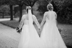 Black and white photo series of wedding dresses captured from behind.