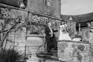 Stone architecture and walls of historic building in black and white.