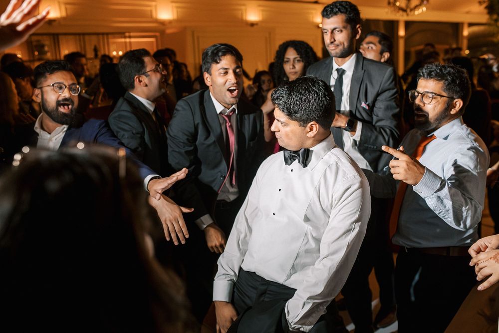 groom at the heart of the celebration at Palácio do Correio-Mor, Portugal wedding photographer capture