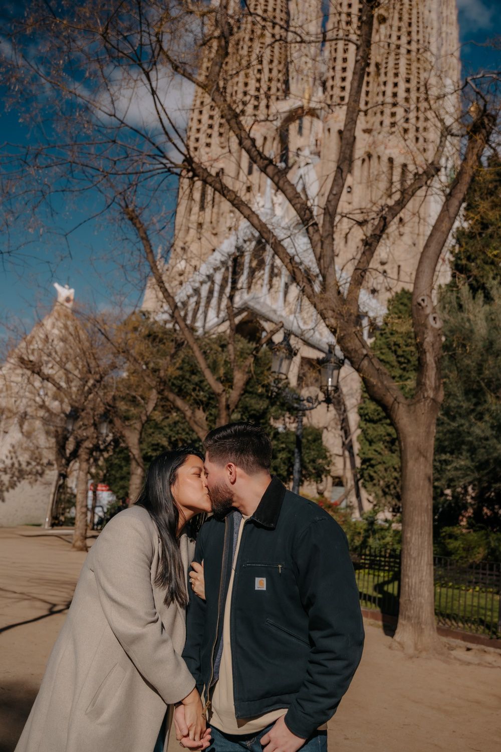 Joyful yes moment near Passion-side playground Sagrada Família Surprise proposal photoshoot Barcelona BarcelonaLoversPH